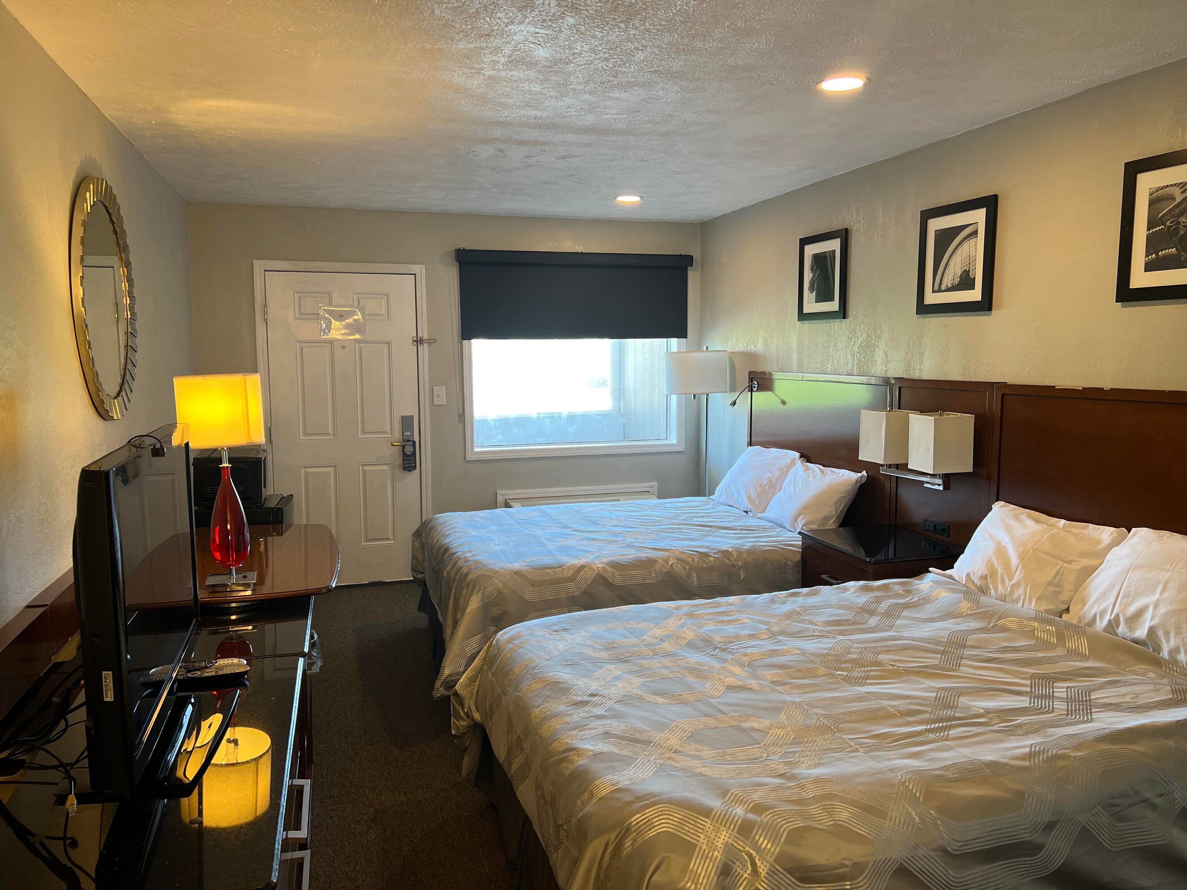 Pillow-top beds, blackout curtains, iron/ironing board, free WiFi