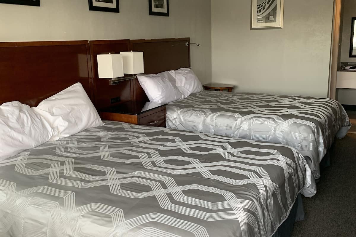 Pillowtop beds, blackout drapes, iron/ironing board, free WiFi