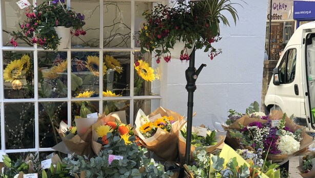 A flower market stall with various potted plants and flower bouquets. - AWARD WINNING Shining Star on the Historic Cartway with River Views (Bridgnorth)