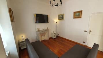 City-Villa | Wohnbereich | Fernseher