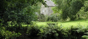 Beautiful converted watermill in a secluded river valley near the sea