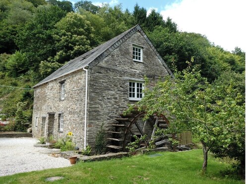 Beautiful converted watermill in a secluded river valley near the sea