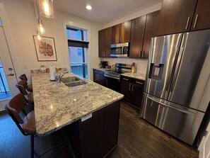 Fridge, microwave, oven, stovetop - Robin's Nest| Rooftop Deck |Walk to Downtown (Nashville)