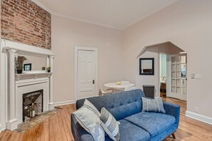 TV, fireplace - Bright, Charming 1BD in Little Five Points (Atlanta)