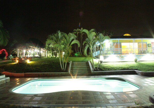 Outdoor pool, pool umbrellas, sun loungers