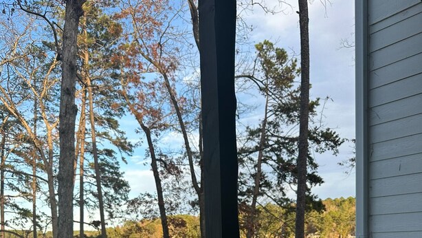 A hot tub with a view of a lake and trees. - Carolina’s Cottage Cove-Lake Keowee (Seneca)