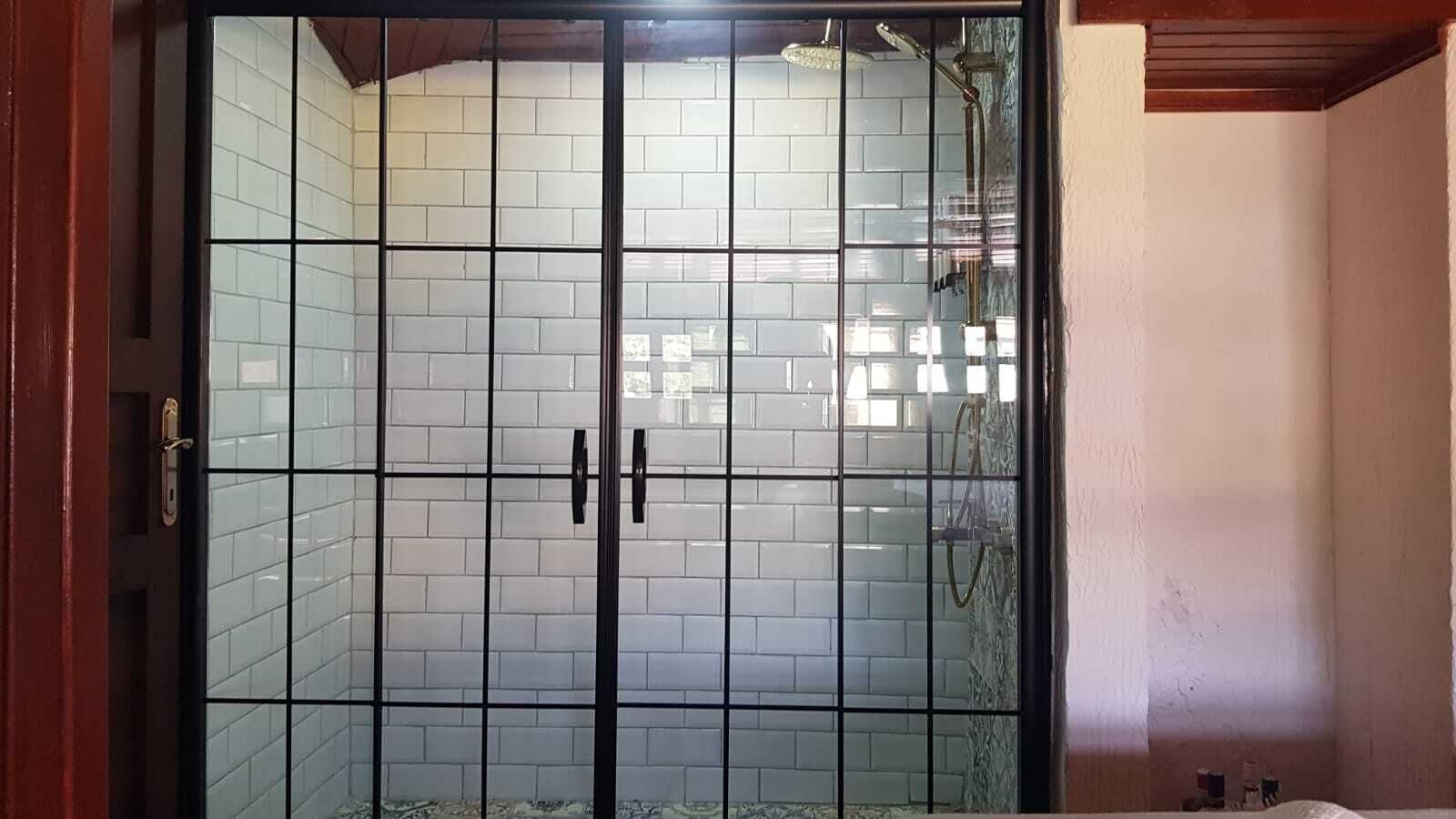 deluxe suite | bathroom | shower, hair dryer, bidet, towels