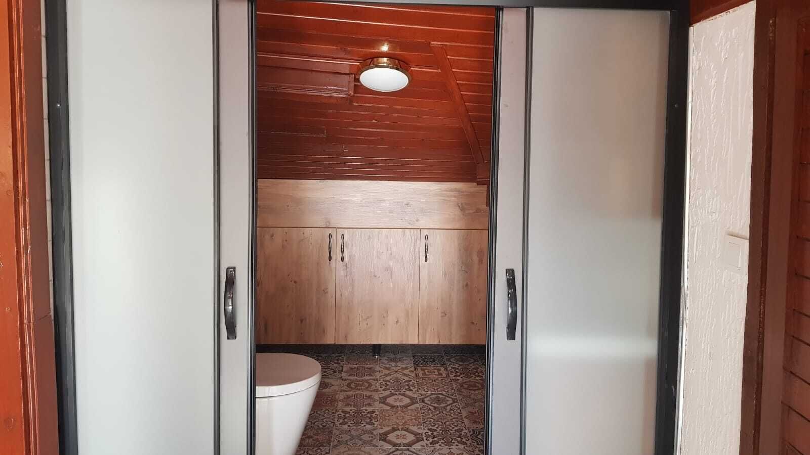 deluxe suite | bathroom | shower, hair dryer, bidet, towels