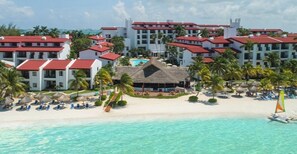 Relax on the pristine beach with a refreshing dip in the pool or a meal at the on-site restaurant.