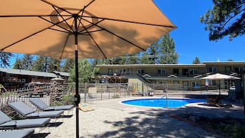 Seasonal outdoor pool, open 9:00 AM to 10:00 PM, sun loungers