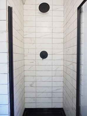 Shower, eco-friendly toiletries, hair dryer, towels