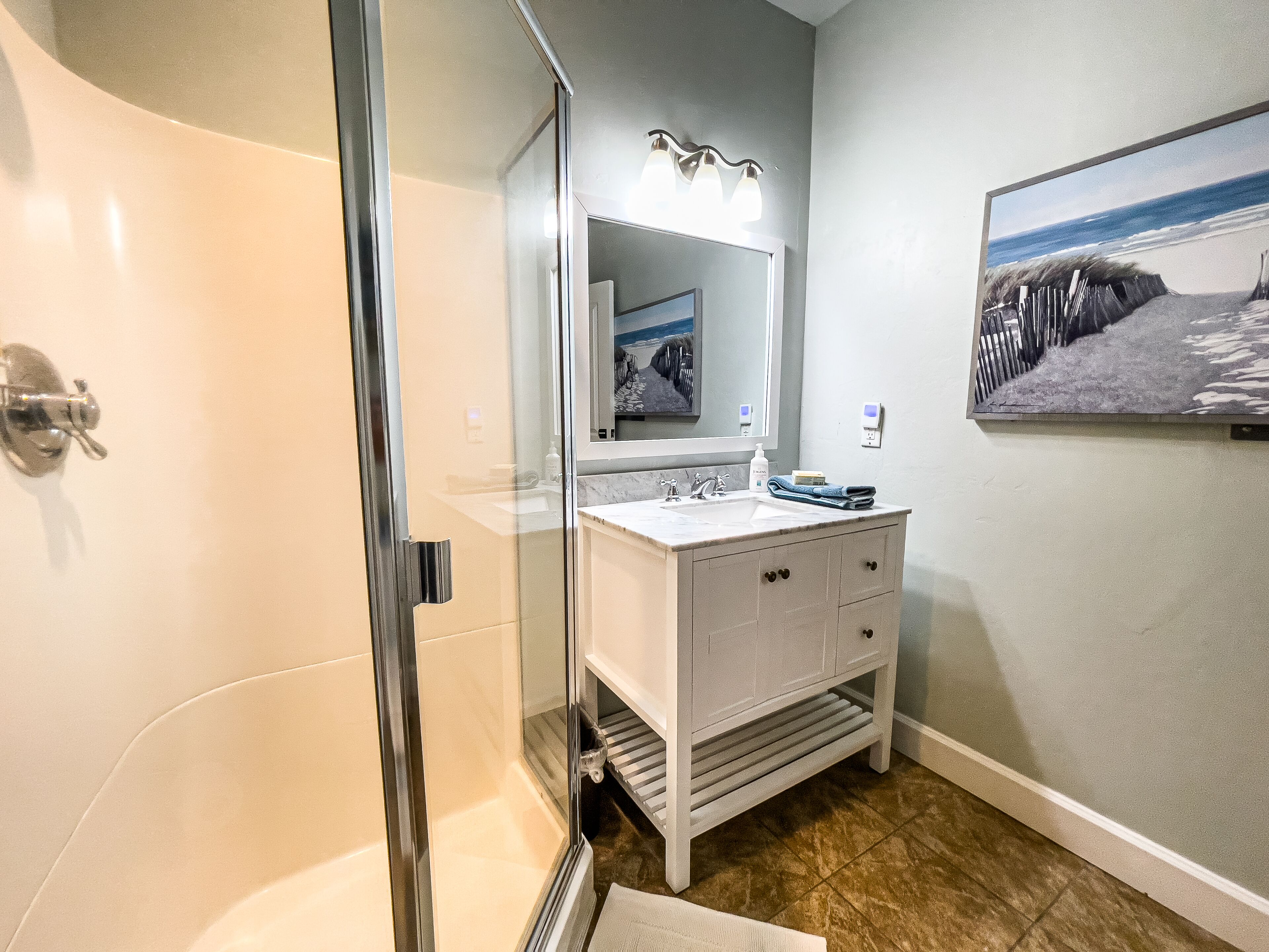 Parkside Cottage 175 East E | Bathroom | Hair dryer, shampoo
