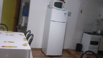 Family Room | Private kitchen | Oven, blender, cleaning supplies, paper towels