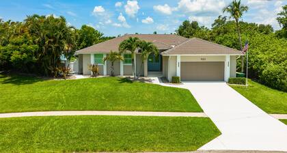 PICKLEBALL & TENNIS COURT ON A PRIVATE LOT WITH A BEAUTIFUL HOME & LARGE POOL