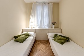 3 habitaciones, tabla de planchar con plancha, wifi y ropa de cama