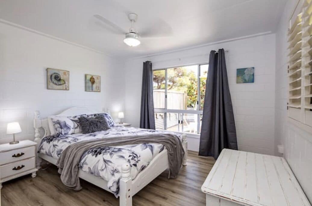 Master bedroom with king bed and amazing sunrise over the ocean 