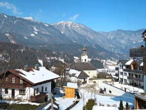 Surrounded by snow-capped mountains and dense forests, this village offers a serene escape with a historic church and traditional architecture.