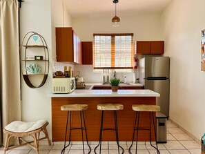 Fridge, microwave, coffee/tea maker, toaster