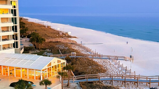 A beachfront hotel with a pool, beach access, and a view of the ocean. - Perdido Skye Beach Front Condo | King Bed/Bunk Quarters | Gulf Front Views | Private Balcony | Pool (Pensacola)