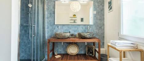Shower, hair dryer, towels, soap