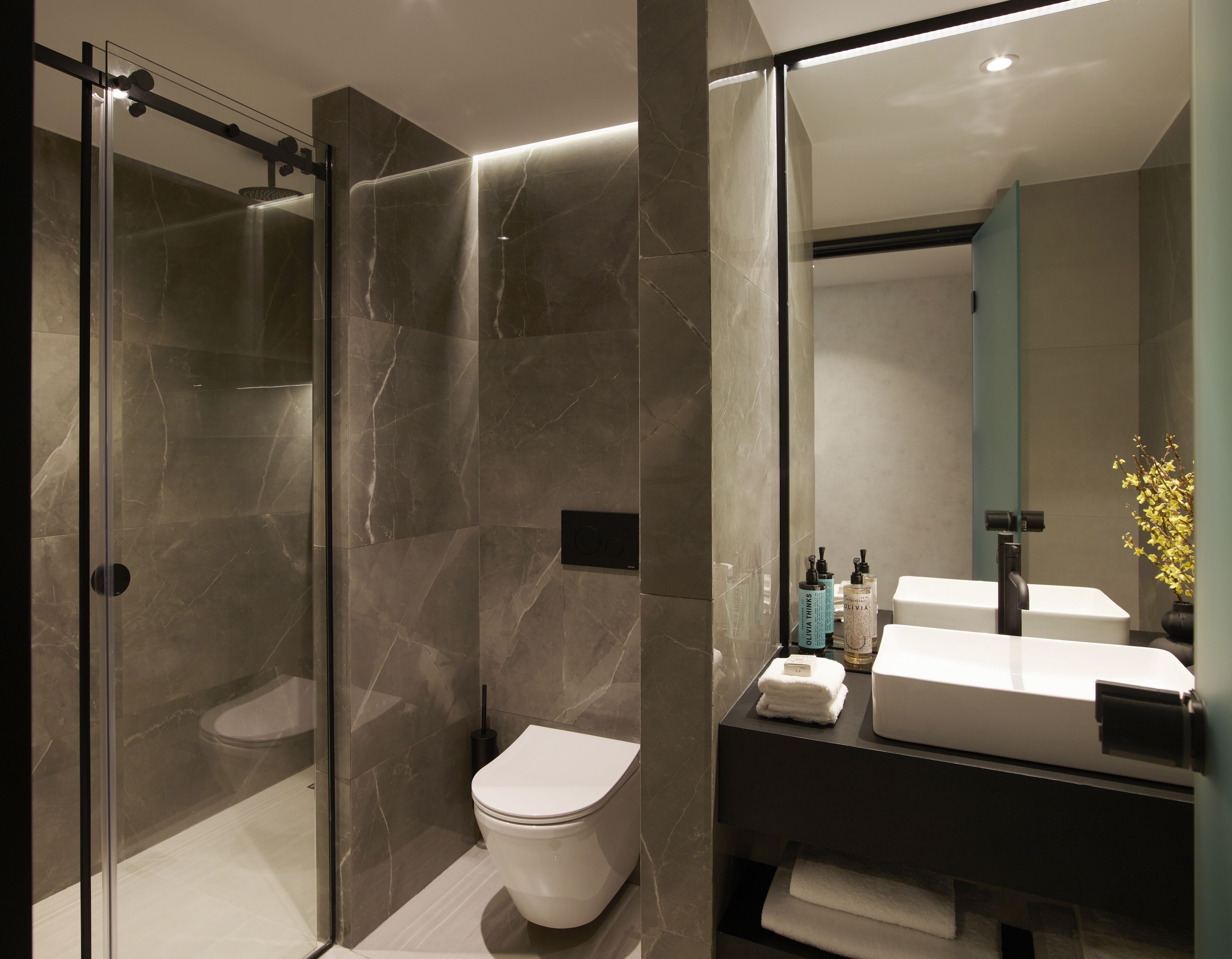 the port double room with balcony and side sea view | bathroom | rainfall showerhead, designer toiletries, hair dryer, slippers