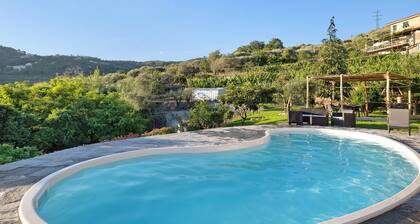Apartment 'Casa Chicken - Mare, Monti E Bikers' with Mountain View, Shared Pool and Wi-Fi