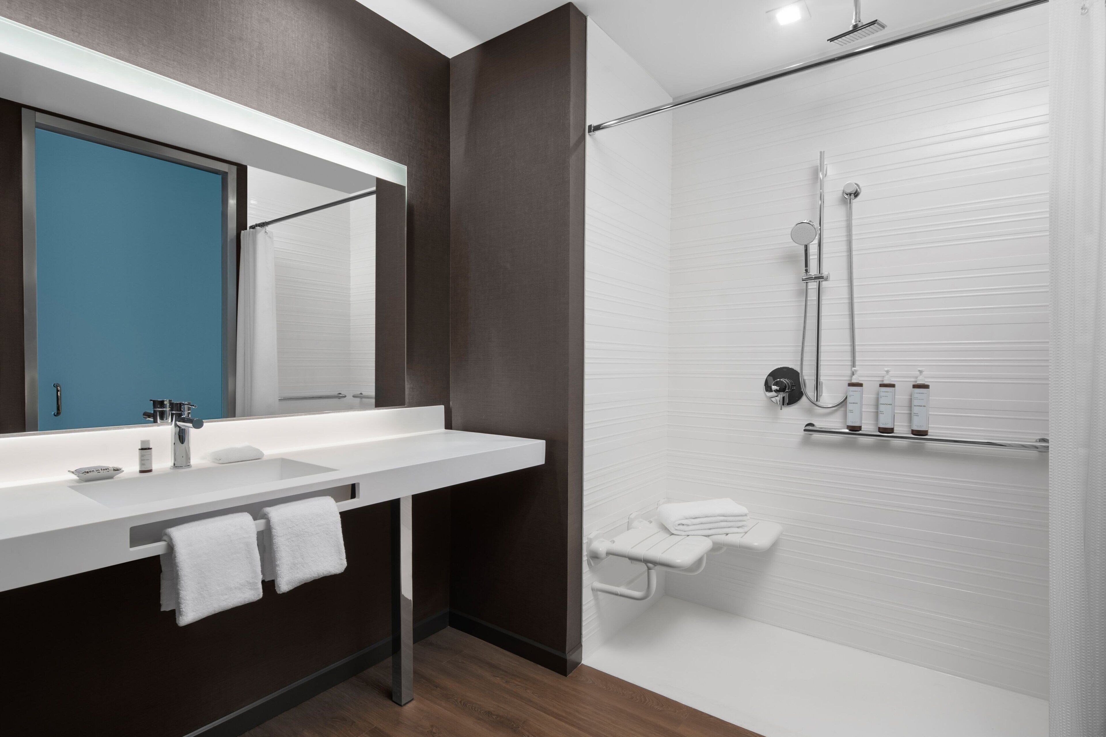 shower, free toiletries, hair dryer, towels