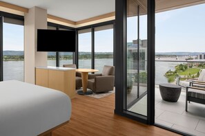 Suite, 1 King Bed, Balcony, River View (Corner) | 1 bedroom, in-room safe, desk, iron/ironing board