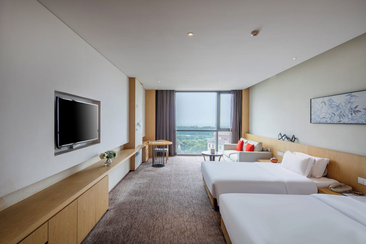 Habitación Confort con 2 camas individuales | Artículos del minibar gratis y caja de seguridad en la habitación
