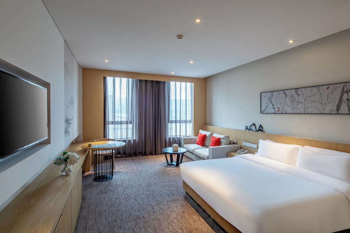 Habitación Deluxe | Artículos del minibar gratis y caja de seguridad en la habitación