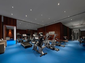 A gym with treadmills, elliptical machines, and weight equipment. - Garrya Xian Lintong (Xi'an)