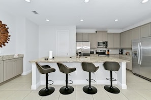 Fridge, oven, stovetop, dishwasher - Marvelous Home near Disney with Private Pool and Waterpark & Resort Access at. (Reunion)