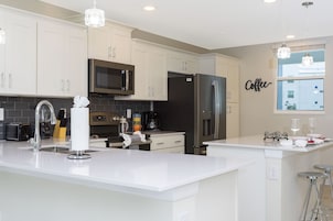 Family Apartment, 2 Bedrooms | Private kitchen | Full-size fridge, microwave, oven, stovetop
