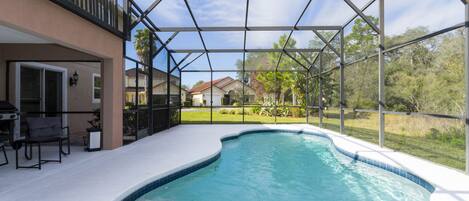 Outdoor pool, pool loungers, lifeguards on site