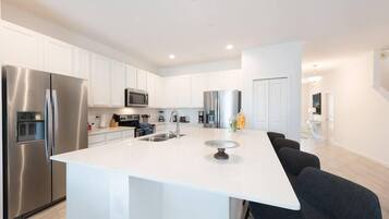 Family Townhome (8 Bedrooms) | Private kitchen | Full-size fridge, microwave, oven, stovetop