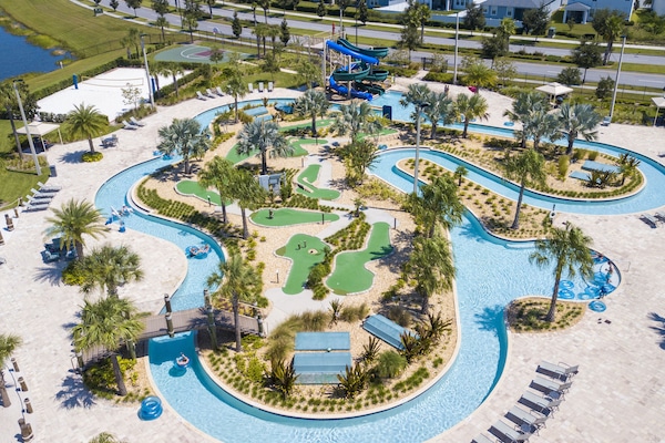 Outdoor pool, sun loungers, lifeguards on site