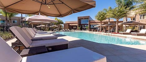 Outdoor pool, sun loungers, lifeguards on site
