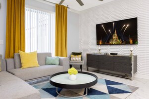 Family Townhome, 4 Bedrooms | Living area | 60-inch Smart TV with cable channels, Netflix, Hulu