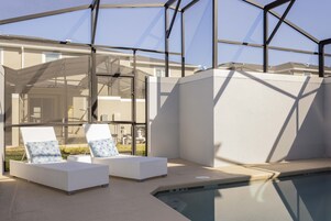 Outdoor pool, sun loungers, lifeguards on site