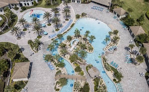 Outdoor pool, pool loungers, lifeguards on site
