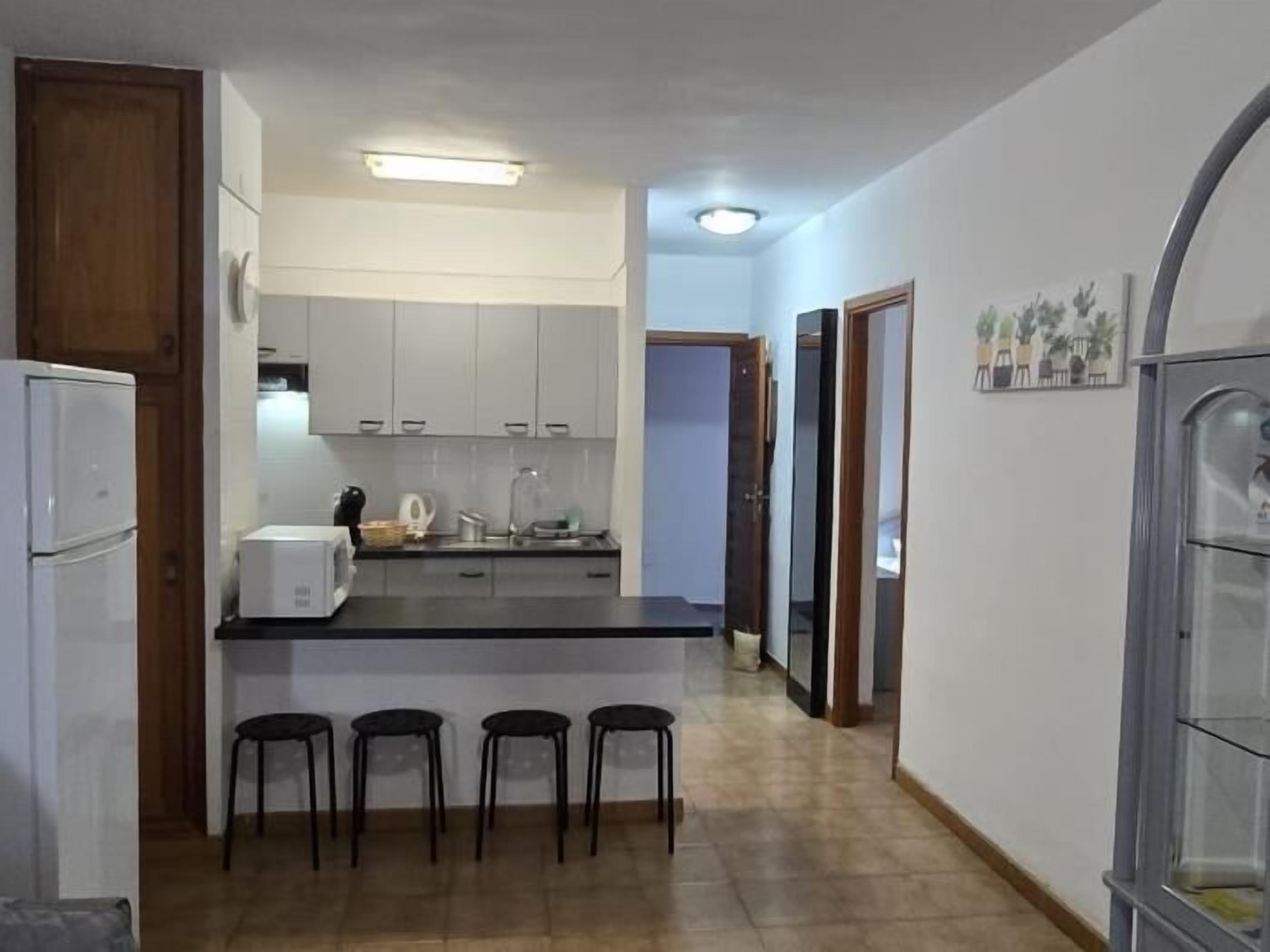 Fridge, microwave, cookware/dishes/utensils