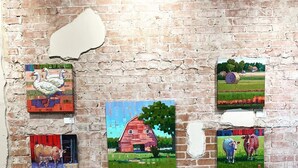 A room with a brick wall and a couch. - 4 Luxury Suites in a beautifully restored historic building in Buffalo, Texas.  (Buffalo)