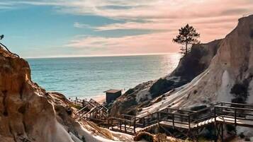 Beach nearby, sun loungers