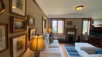 Smart TV, fireplace, books