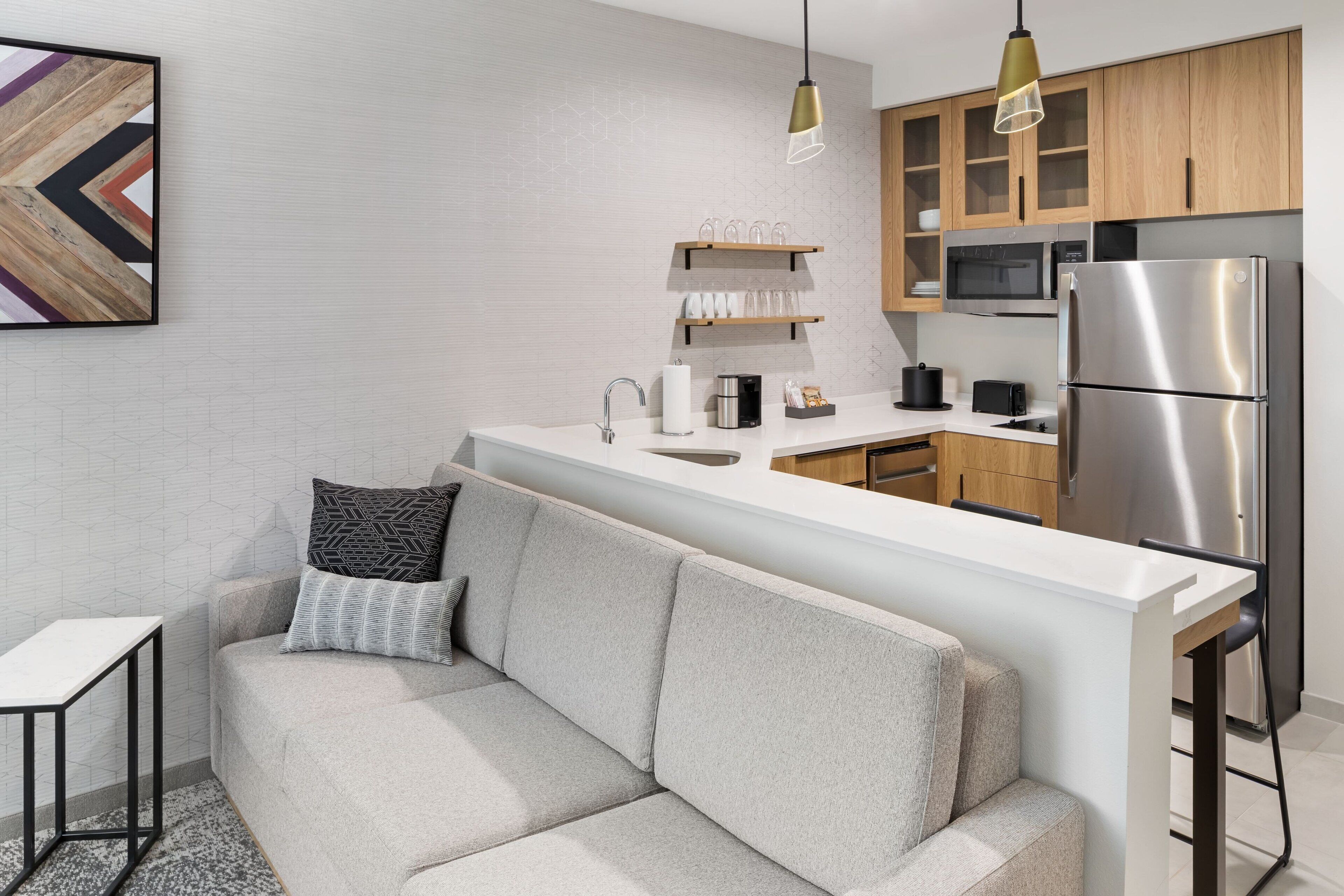 Full-size fridge, microwave, stovetop, dishwasher