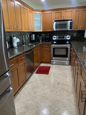 Private kitchen - Entire condominium with a pool view, steps from the beach (Sunny Isles Beach)