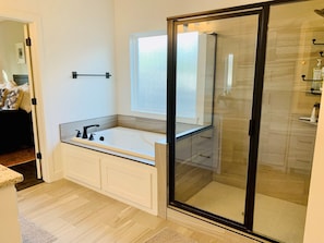Combined shower/tub, jetted tub