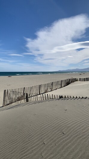 Beach nearby, sun loungers