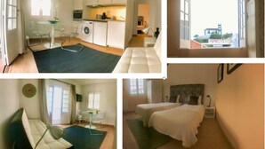A room with a bed, a desk, and a window.