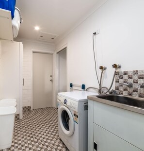 Bathtub, hair dryer, towels